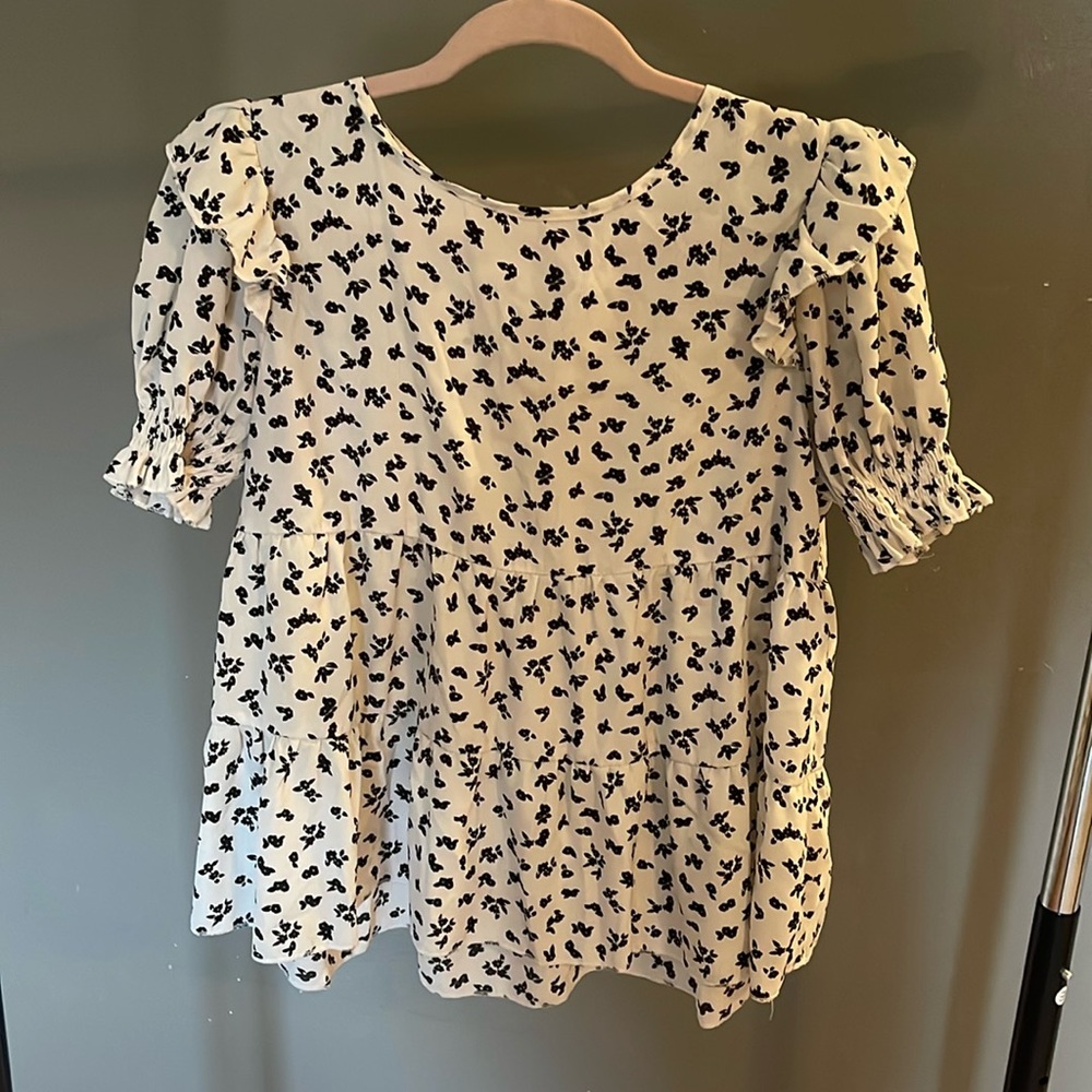 Floral blouse with bow tie in back. Medium.